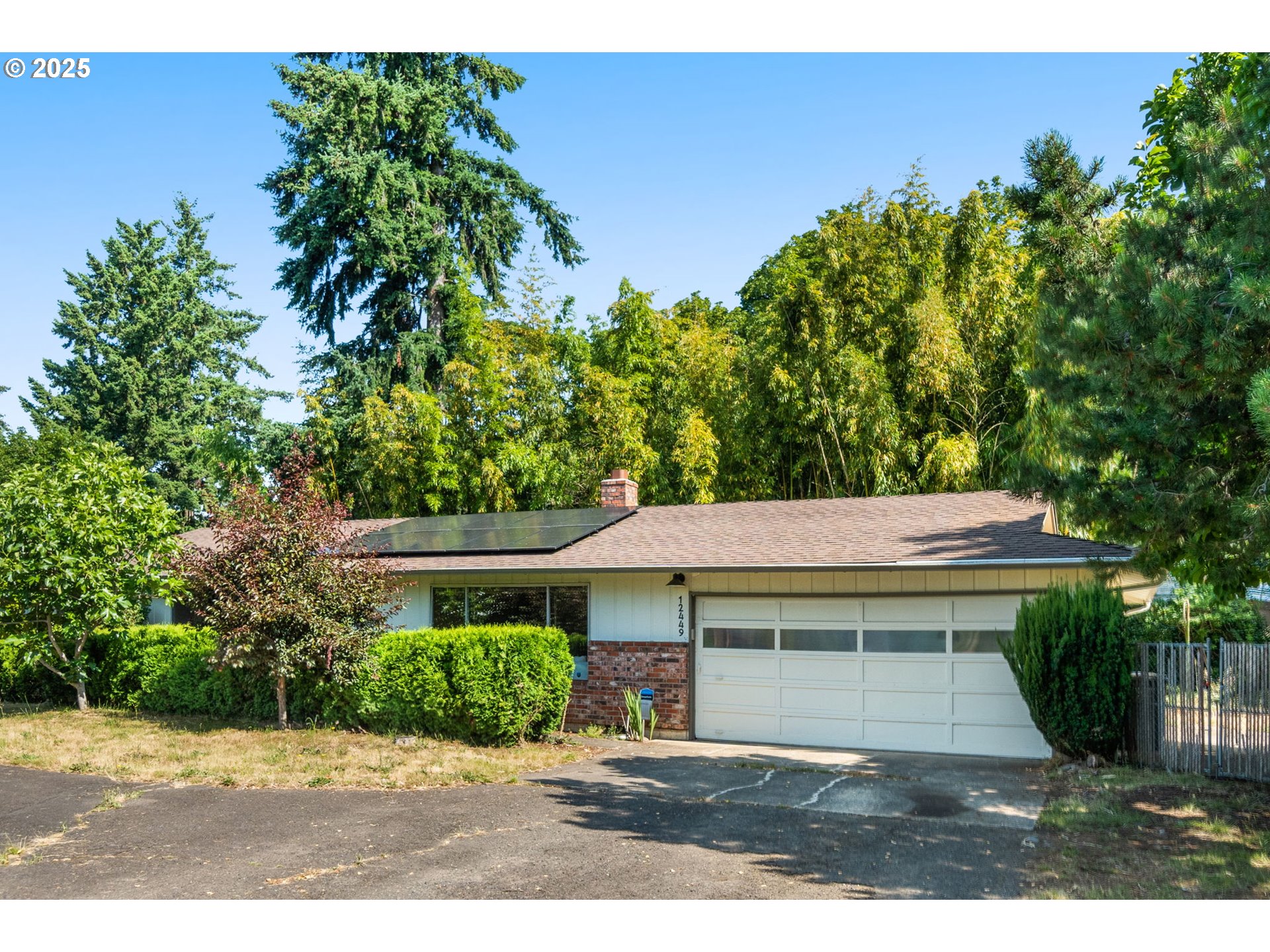 Ideal one level has it all: cozy wood fireplace, fenced yard, RV/boat parking and an oversized 2 car garage on a .22 acre private, fenced lot with 2 gates. This 1274 square foot 3 bedroom and 2 bath ranch with newer vinyl plank, carpet, new solar panel array, heat pump A/C, all appliances and washer/dryer included also includes a crawlspace refresh, fresh landscaping and new gutter guards. Enjoy summer in your new roomy garden with plums, apples, rhubarb, raspberries and grapes. Attic storage with pull down stairs. RV parking includes electric hookup. Excellent home energy score of 7. Solar panel agreement to be assumed by buyer at no cost to buyer. This owner-occupied home is in sound condition and is being sold as-is. Seller to make no repairs but may agree to a reasonable credit if any repairs are needed. Request seller-provided inspection, radon and underground tank reports. Multiple offers are likely on this one, so make your strongest offer. [Home Energy Score = 7. HES Report at https://rpt.greenbuildingregistry.com/hes/OR10203412]