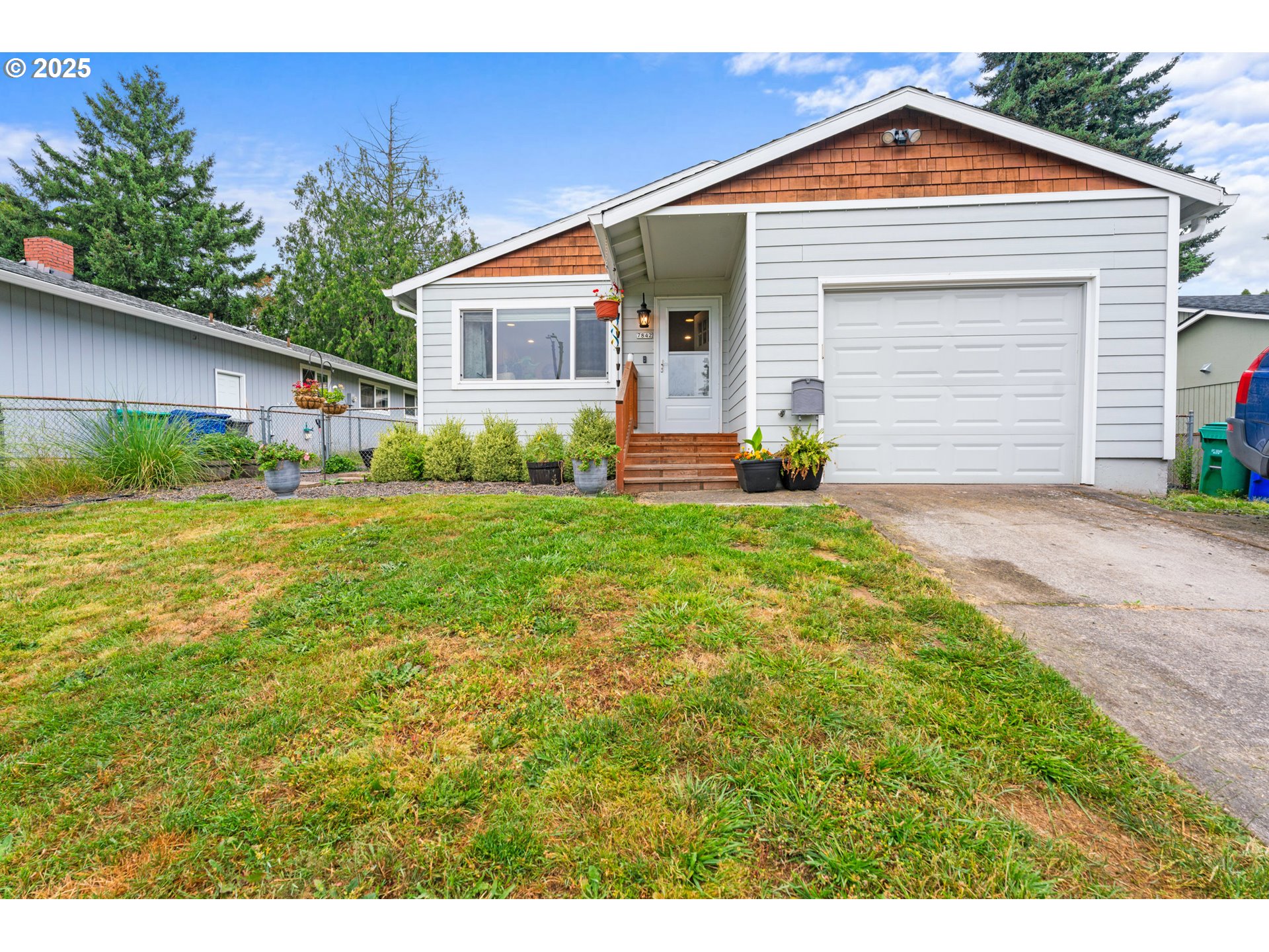 Fresh and cozy single level ranch for a first time home buyer or someone looking to down size, this revamped home is in a fantastic location! Right on the edge of Southeast Portland, just across the road from Happy Valley and less than two miles from the freeway. Since purchased, the home has had the garage floor insulated and sheet rocked with new textured flooring and custom blinds on every window. Updates from 2018 include tastefully updated bath and kitchen with garden window and pantry, gas furnace, central air, gas fireplace, tankless h2O, and kitchen appliances. Also new windows, doors, gutters and French drains. French doors from the dining room lead to a partially covered deck with lovely privacy wall, perfect for summer barbeques and morning coffee. Dog run and yard for a nice tucked away ranch!